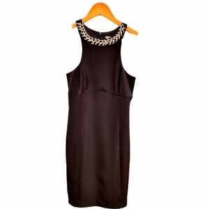 Little Black Dress with rhinestone neckline. Breakfast at Tiffany's esque!